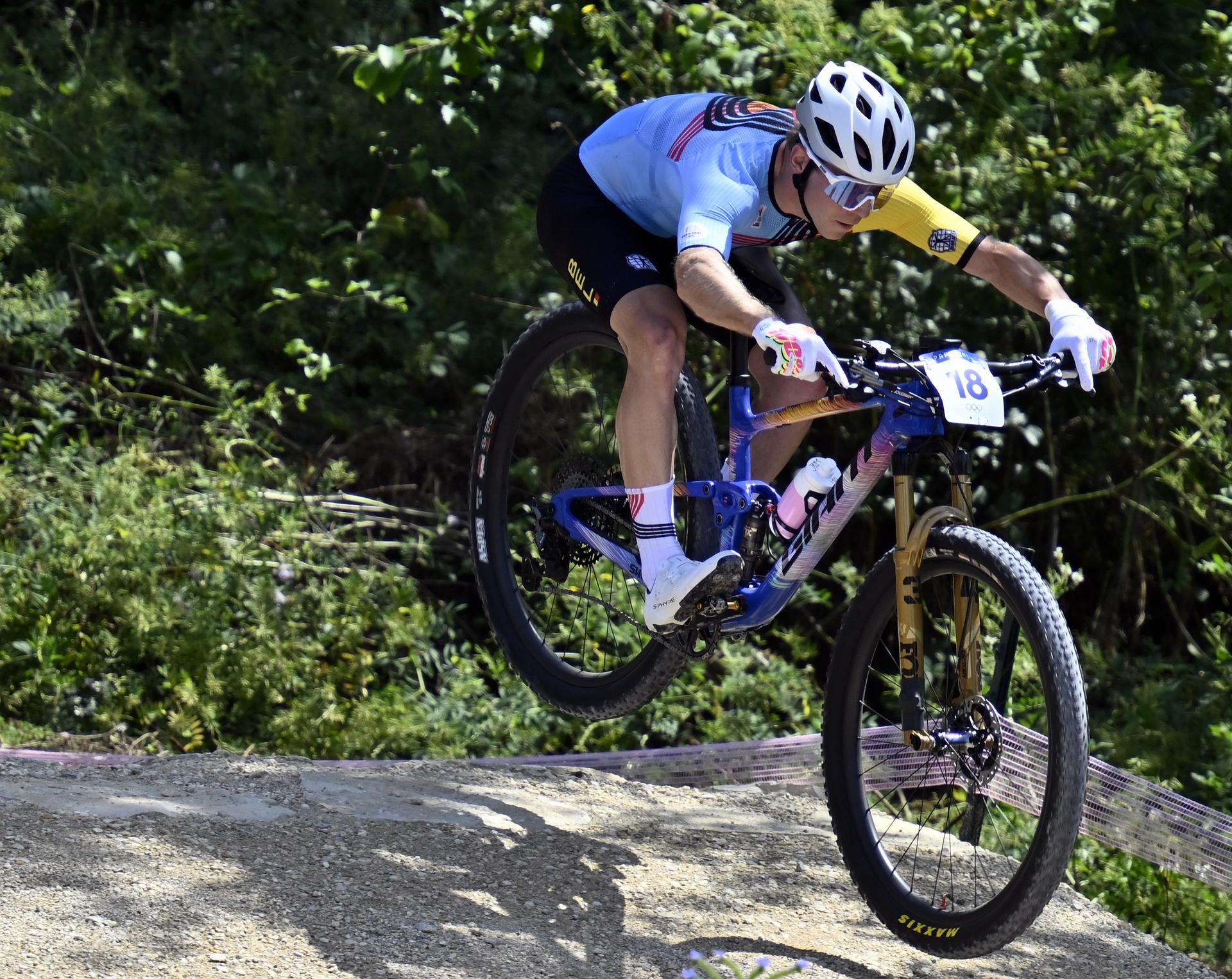 Belgian Jens Schuermans pictured in action during the men's cross-country mountain bike cycling race at the Paris 2024 Olympic Games, at the Colline d'Elancourt climb near Paris, France on Monday 29 July 2024. The Games of the XXXIII Olympiad are taking place in Paris from 26 July to 11 August. The Belgian delegation counts 165 athletes competing in 21 sports. BELGA PHOTO DIRK WAEM
