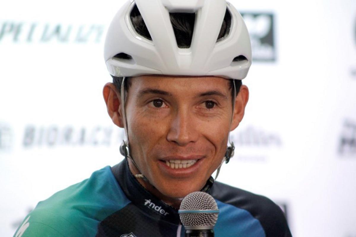 Colombian cyclist Miguel Angel Lopez speaks during his presentation as new rider for Team Medellin EPM, in Medellin, Colombia, on January 17, 2023. In December 2022 Lopez was fired by the Astana team, who claim he had links to a Spanish doctor at the heart of a doping investigation. Lopez denies any connection to doping. The 28-year-old Lopez won a stage on the Tour de France in 2020, won the best young rider category on the Giro d'Italia in 2018 and 2019 and finished third in both the Giro and Vuelta a Espana in 2018. Fredy BUILES / AFP