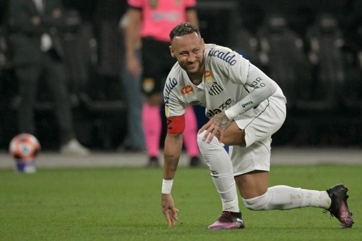 (FILES) (FILES) Santos' forward #10 Neymar reacts during the Campeonato Paulista A1 football match between Corinthians and Santos at Arena Corinthians in Sao Paulo on February 12, 2025. Cristiano Ronaldo, Neymar, Salah, Pedri and Lamine Yamal - the new jewel of soccer - will be absent from the 2025 Club World Cup, which kicks off on June 14, 2025 in the United States. The tournament, which will debut in an expanded format, aims to mark an era, albeit without several of the most recognized stars on the global stage. NELSON ALMEIDA / AFP