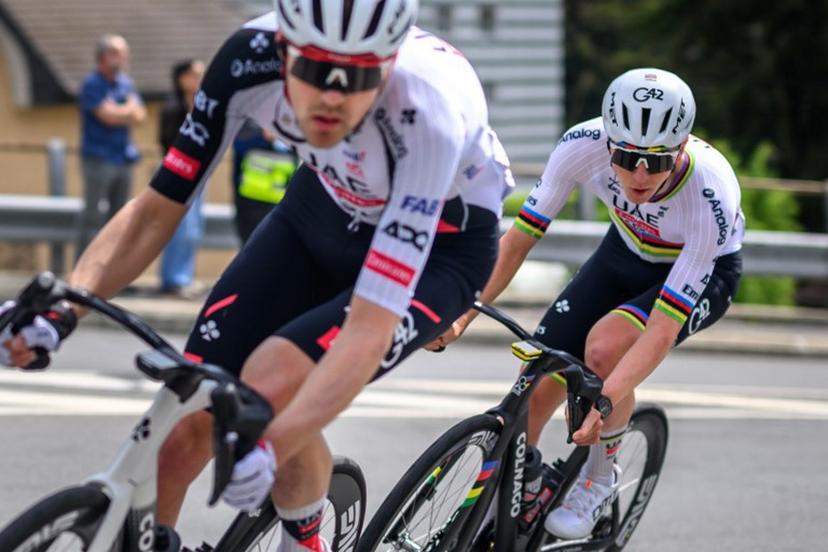 UAE Team Emirates-XRG's Slovenian rider Tadej Pogacar (R) cycles during the first stage of the Tour of Romandie UCI cycling World tour, a 171.2 km loop from Martigny-Ville to Martigny-Ville, in Martigny on April 29, 2026.  Fabrice COFFRINI / AFP