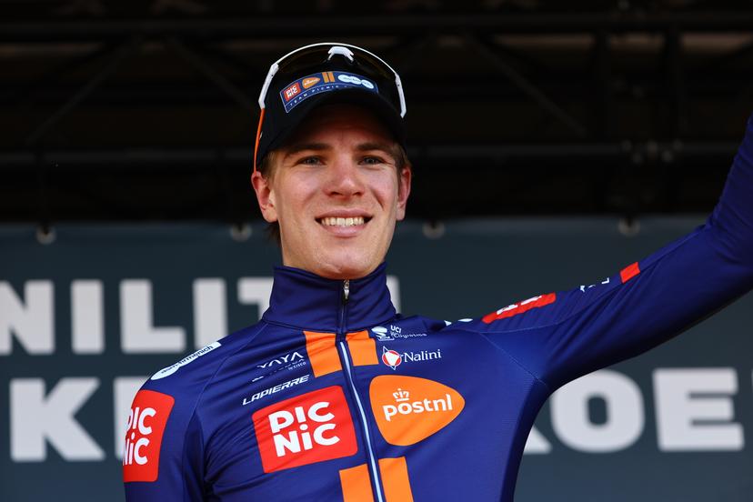 Winner Dutch Nils Eekhoff of Team Picnic PostNL celebrates on the podium of the 'Nokere Koerse' one day cycling race for men elite, 188.1 km from Deinze to Nokere, on Wednesday 19 March 2025. BELGA PHOTO DAVID PINTENS