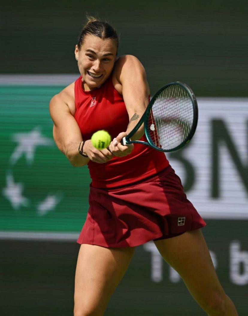 Belarus' Aryna Sabalenka returns the ball to Russia's Mirra Andreeva during the women's singles final tennis match at the BNP Paribas Open at the Indian Wells Tennis Garden in Indian Wells, California, on March 16, 2025.  Patrick T. Fallon / AFP