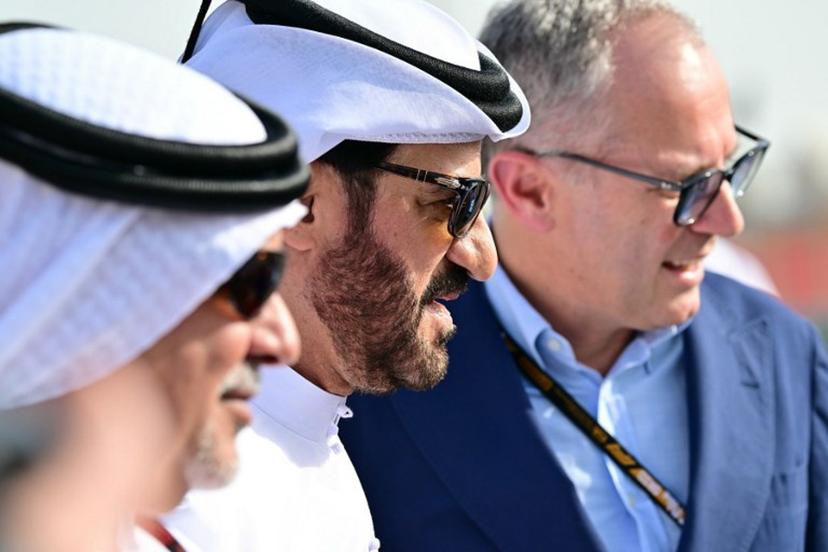 Formula One CEO Stefano Domenicali (R), FIA president Mohammed Ben Sulayem (C) and Bahrain Crown Prince Salman bin Hamad Al Khalifa pose ahead of the Bahrain Formula One Grand Prix at the Bahrain International Circuit in Sakhir on April 13, 2025.  Giuseppe CACACE / AFP