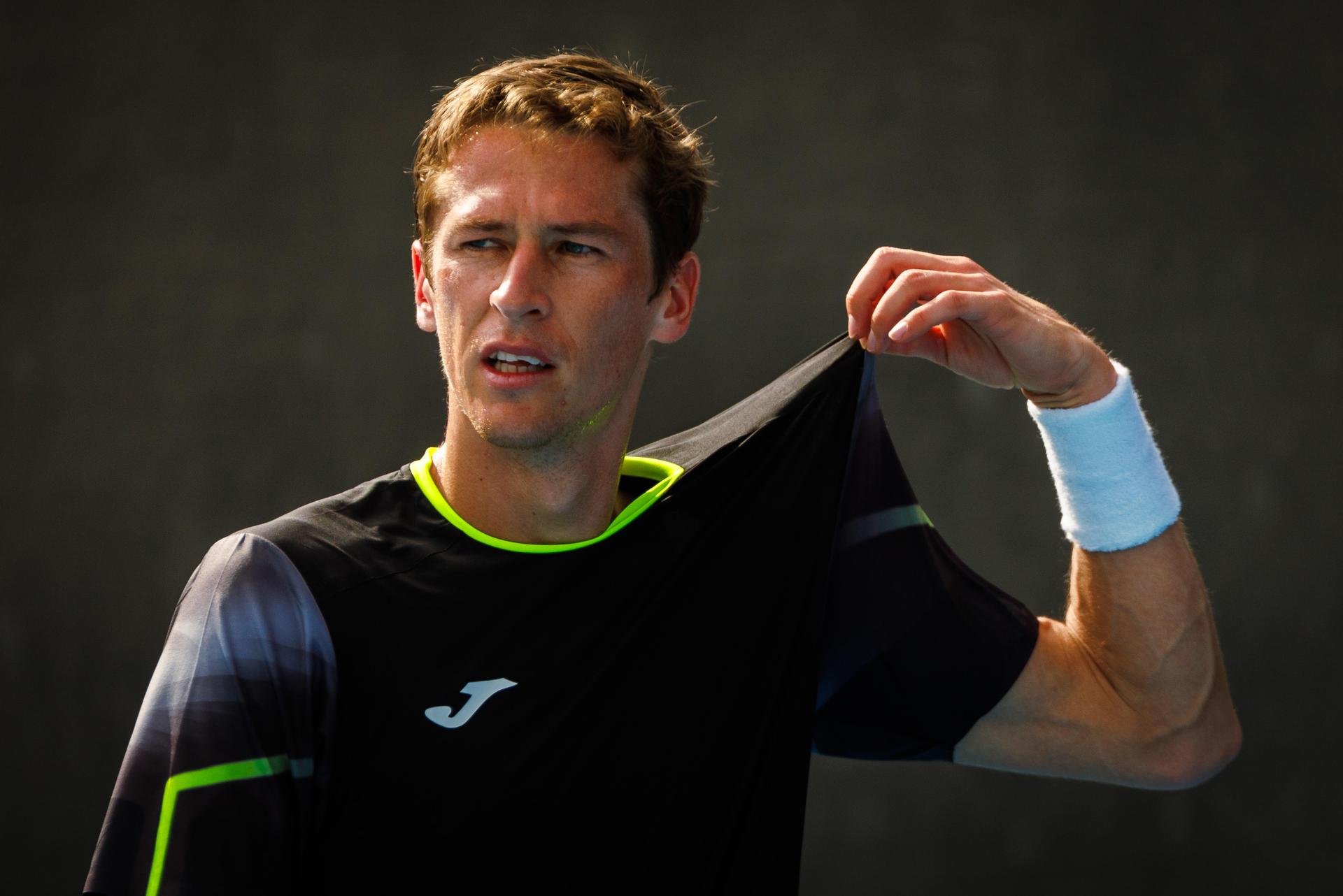 Belgian Kimmer Coppejans pictured in action during a tennis match against Monegasque Vacherot, in the third round of the qualifiers for the men's singles tournament, at the 'Australian Open' Grand Slam tennis tournament, Thursday 09 January 2025 in Melbourne Park, Melbourne, Australia. The 2024 edition of the Australian Grand Slam takes place from January 14th to January 28th. BELGA PHOTO PATRICK HAMILTON