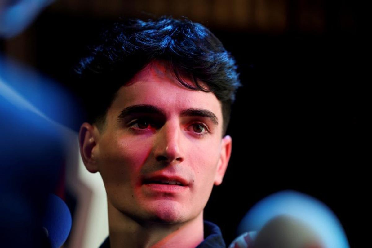 Groupama-FDJ French rider Ewen Costiou looks on as he attends his team's 2026 presentation in Paris on January 9, 2026.  Anne-Christine POUJOULAT / AFP