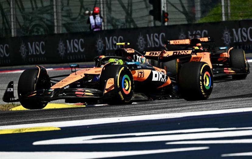 McLaren's British driver Lando Norris drives ahead of team mate McLaren's Australian driver Oscar Piastri at the start of the Formula One Austrian Grand Prix at the Red Bull Ring race track in Spielberg, Austria, on June 29, 2025.  Joe Klamar / AFP