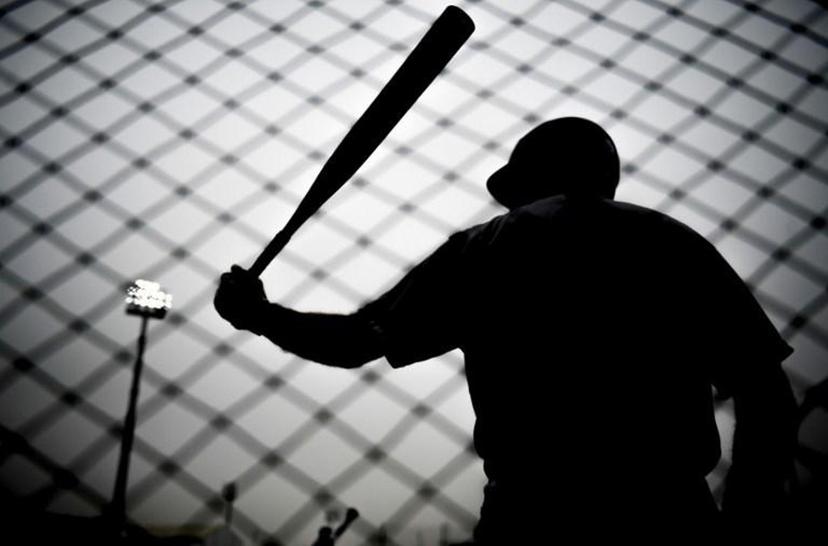 A players warms up before the start of the Softball's Men Grand Final between the US and Argentina during the Lima 2019 Pan-American Games in Lima, on August 1, 2019.  Ernesto BENAVIDES / AFP