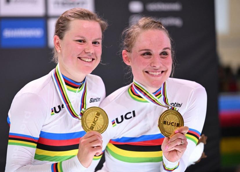 Winner Team Denmark's Amalie Dideriksen and Julie Leth celebrate during the podium ceremony after the women's Madison race of the UCI Track Cycling World Championships in Ballerup, Denmark, on October 19, 2024.  Jonathan NACKSTRAND / AFP