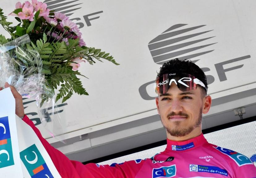 Team St Michel-Auber 93's Jason Tesson of France celebrates on the podium after winning the second stage of the "4 jours de Dunkerque" (Four days of Dunkirk) cycling race and taking the lead in the general classification, in Maubeuge, Northern France, on May 4, 2022.  FRANCOIS LO PRESTI / AFP