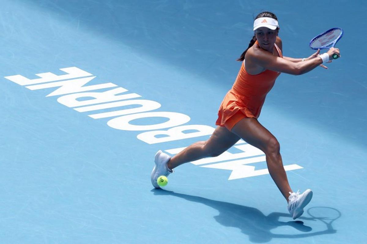 USA's Jessica Pegula hits a return to compatriot Amanda Anisimova during their women's singles quarter-final match on day eleven of the Australian Open tennis tournament in Melbourne on January 28, 2026.  IZHAR KHAN / AFP
