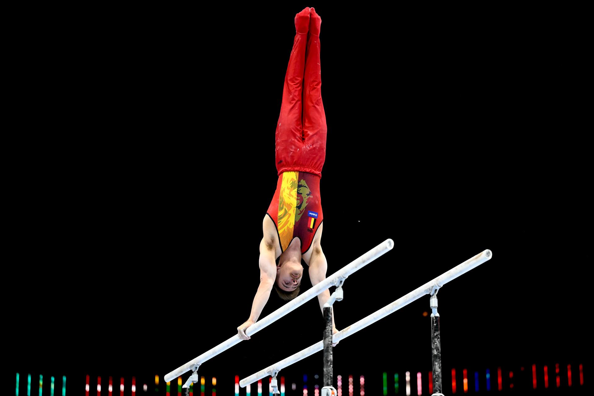 Belgian gymnast Nicola Cuyle pictured in action at the parallel bars during the men's qualifications on the first day of the Artistic Gymnastics World Championships, in Antwerp, Saturday 30 September 2023. The Worlds take place in Antwerp from 30 September to 08 October. BELGA PHOTO DIRK WAEM
