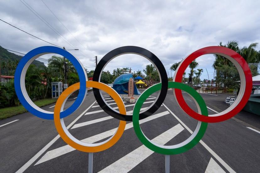 This photograph shows the Olympics rings on the "End of the road" to Teahupo'o on the island of Tahiti, French Polynesia on July 20, 2024, ahead of the opening ceremony of the Paris 2024 Olympic and Paralympic Games.  Jerome Brouillet / AFP