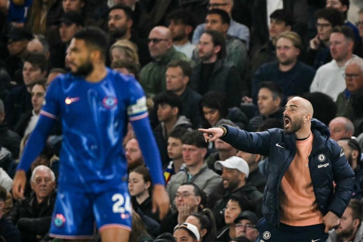 Chelsea's Italian head coach Enzo Maresca reacts during the English Premier League football match between Chelsea and Tottenham Hotspur at Stamford Bridge in London on April 3, 2025.  Glyn KIRK / AFP