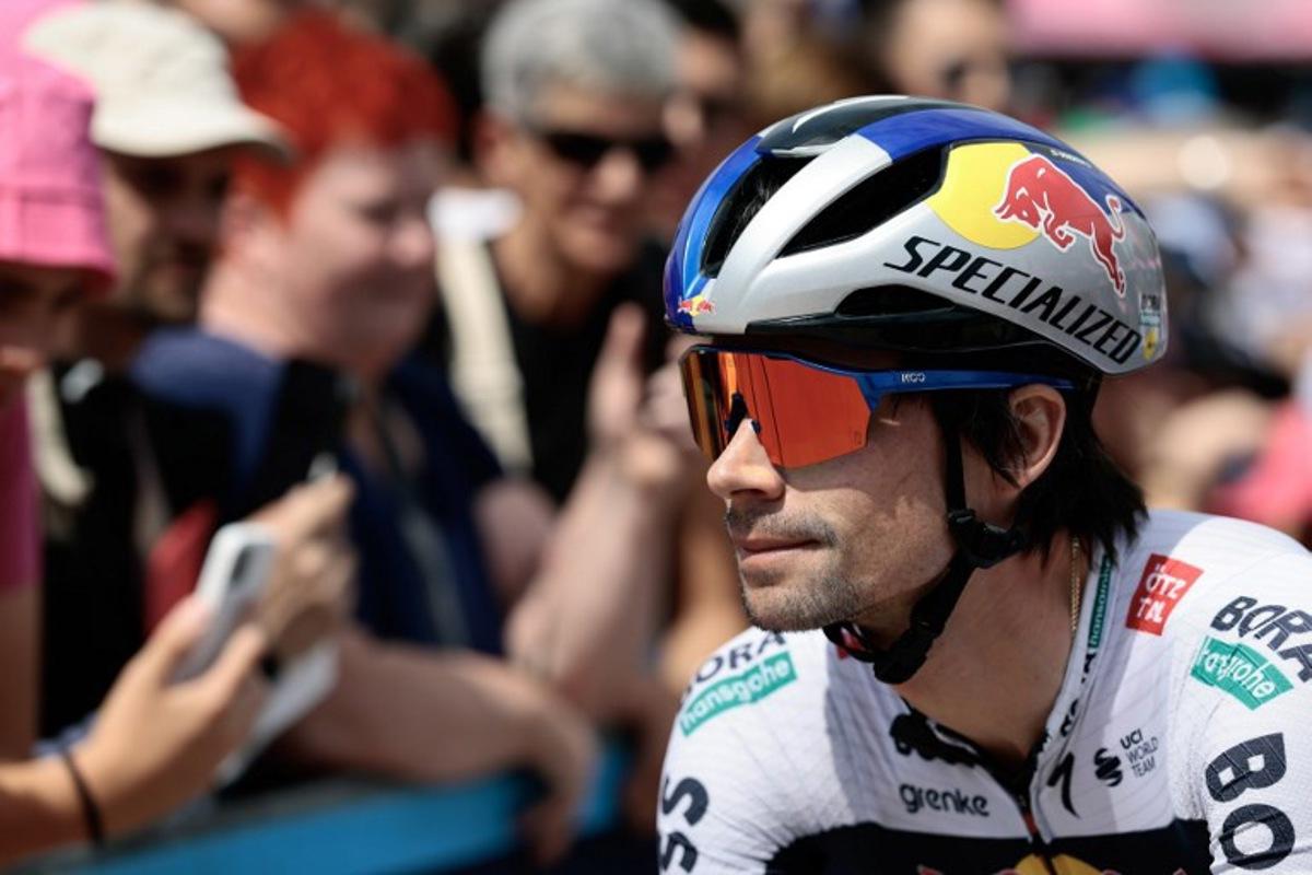 Red Bull-Bora-Hansgrohe's Slovenian rider Primoz Roglic awaits the start of the 15th stage of the 108th Giro d'Italia cycling race of 219kms from Fiume Veneto to Asiago on May 25, 2025.  Luca Bettini / AFP