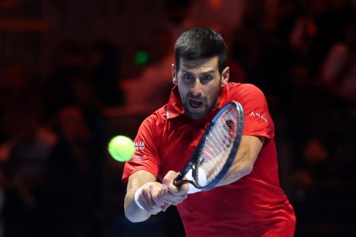 Serbia's Novak Djokovic hits a return against US' Taylor Fritz during the third-placed match at the Six Kings Slam exhibition tennis tournament in Riyadh on October 18, 2025.  Fayez NURELDINE / AFP