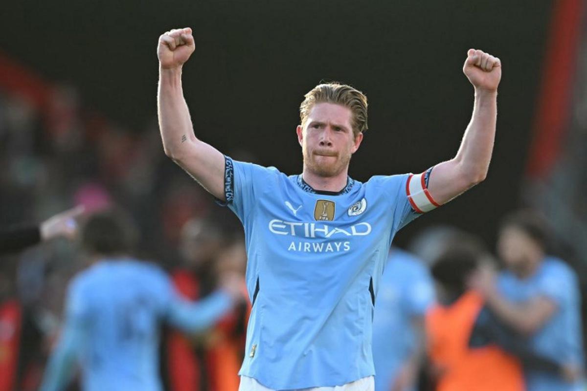 Manchester City's Belgian midfielder #17 Kevin De Bruyne celebrates on the final whistle in the English FA Cup quarter-final football match between Bournemouth and Manchester City at the Vitality Stadium in Bournemouth, on the south coast of England on March 30, 2025. City won the game 2-1. JUSTIN TALLIS / AFP