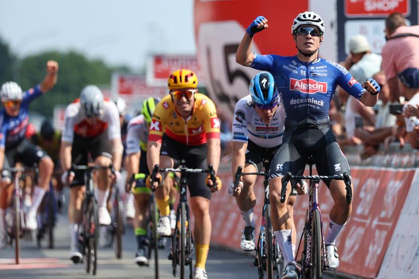 Belgian Jasper Philipsen of Alpecin-Deceuninck celebrates as he crosses the finish line to win the Elfstedenronde one day cycling race, race 8 (out of 10) of the Lotto Cycling Cup, 190,3km with start and finish in Brugge, Sunday 11 June 2023. BELGA PHOTO DAVID PINTENS