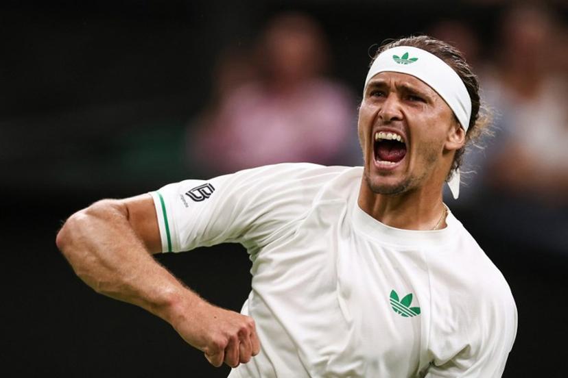 Germany's Alexander Zverev celebrates after winning the second set against France's Arthur Rinderknech  during their men's singles first round tennis match on the first day of the 2025 Wimbledon Championships at The All England Lawn Tennis and Croquet Club in Wimbledon, southwest London, on June 30, 2025.  HENRY NICHOLLS / AFP