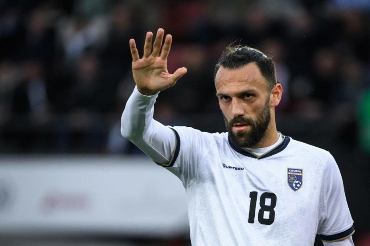 Kosovo's forward Vedat Muriqi gestures during a friendly football match between Switzerland and Kosovo at Stadion Letzigrund stadium in Zurich on March 29, 2022.  Fabrice COFFRINI / AFP