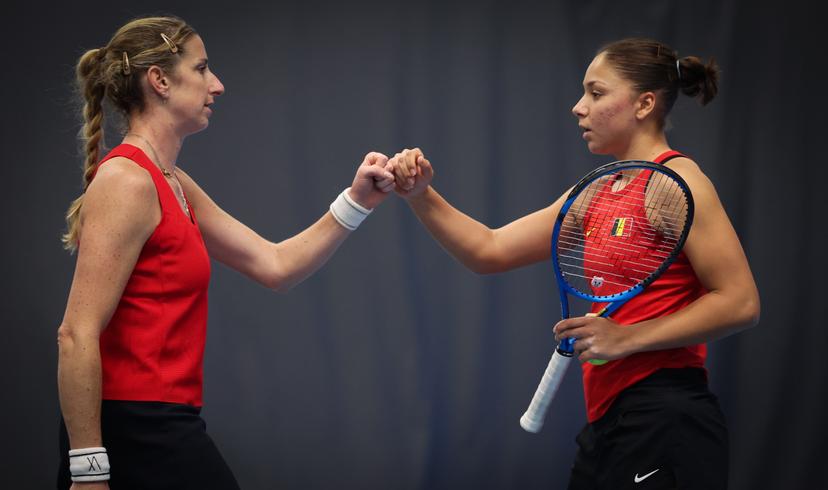 Belgian Magali Kempen, and Belgian Sofia Costoulas pictured during a double tennis match between Belgians Belgian Costoulas/Kempen and Greeks Christofi/Pavlou, in the qualifiers of the Billie Jean King Cup tennis, in Vilnius, Lithuania on Tuesday 08 April 2025. PHOTO VIRGINIE LEFOUR