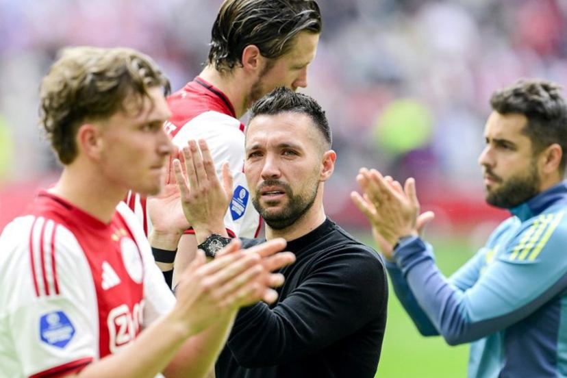 Ajax Italian coach Francesco Farioli (C) reacts after winning the Dutch Eredivisie football match between  Ajax Amsterdam and FC Twente at the Johan Cruijff ArenA, in Amsterdam on May 18, 2025.  Olaf Kraak / ANP / AFP