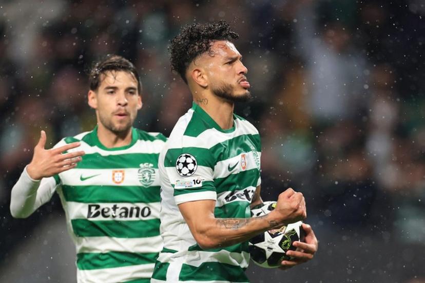 Sporting Lisbon's Colombian forward #97 Luis Suarez (R) celebrates scoring his team's third goal with Sporting Lisbon's Portuguese midfielder #23 Daniel Braganca during the UEFA Champions League last 16 second leg football match between Sporting CP and Bodoe/Glimt at Jose Alvalade stadium in Lisbon on March 17, 2026.  PATRICIA DE MELO MOREIRA / AFP