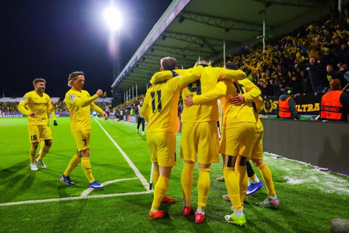 Bodo/Glimt's Norwegian forward #10 Jens Petter Hauge (R) celebrates scoring with his teammates during the UEFA Champions League first-leg, play-off football match  Bodo/Glimt vs Inter Milan at Aspmyra statium in Bodo, Norway on February 18, 2026.   Thomas Andersen / NTB / AFP