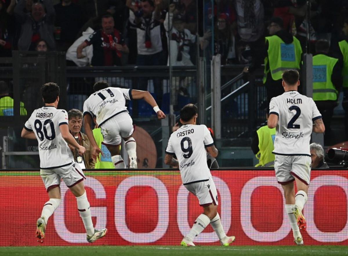 Bologna's Swiss forward #11 Dan Ndoye celebrates after scoring a goal during the Italian Cup (Coppa Italia) final football match between AC Milan and Bologna at the Olympic stadium in Rome, on May 14, 2025.  Isabella BONOTTO / AFP