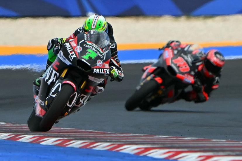 Fantic Racing Lino Sonego team's Belgian Moto2 rider Barry Baltus (L) competes during the Moto2 race as part of the San Marino Moto GP at the Misano World Circuit Marco Simoncelli, in Misano Adriatico, northern Italy, on September 14, 2025.  Andreas SOLARO / AFP