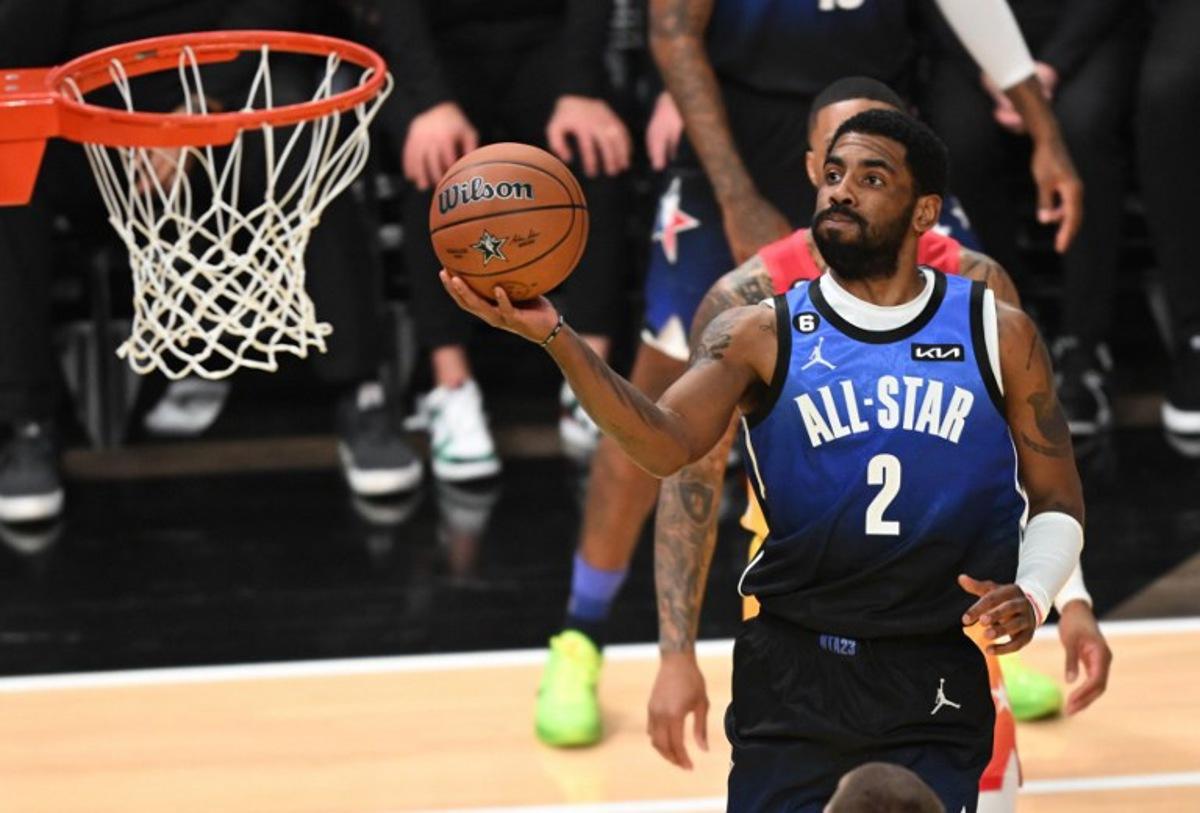 Dallas Mavericks' pro-basketball player Kyrie Irving goes for the shot during the NBA All-Star game between Team Giannis and Team LeBron at the Vivint arena in Salt Lake City, Utah, February 19, 2023.   Patrick T. Fallon / AFP