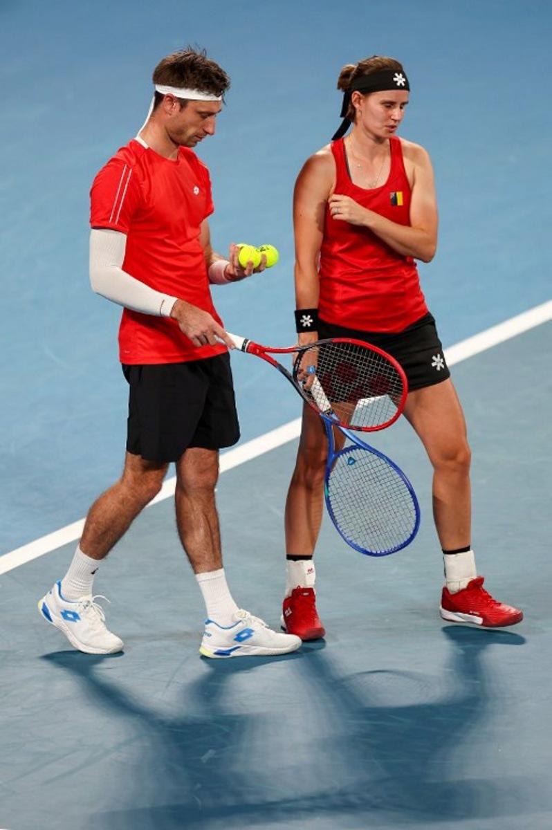 Belgium's Sander Gille (L) and Greet Minnen prepare to serve to Czech Republic's Linda Fruhvirtova and Dalibor Svrcina during their mixed-doubles quarter-final match at the United Cup tennis tournament at Ken Rosewall Arena in Sydney on January 8, 2026.  Izhar KHAN / AFP