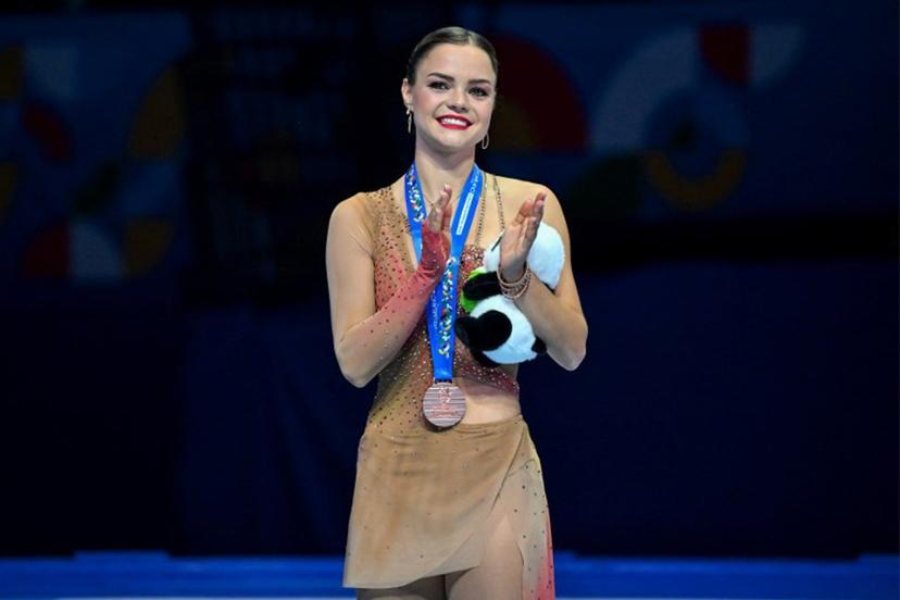Bronze medallist Belgium's Loena Hendrickx attends an awards ceremony for women's free skating during the ISU Skate to Milano Figure Skating Qualifier 2025 in Beijing on September 20, 2025.  ADEK BERRY / AFP