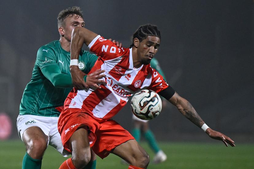 Lommel's Jesper Tolinsson and Kortrijk's Bryan Adinany fight for the ball during a soccer game between Lommel SK and KV Kortrijk, Saturday 07 March 2026 in Lommel, on day 28 (out of 34) of the 2025-2026 'Challenger Pro League' 1B second division of the Belgian championship. BELGA PHOTO JOHAN EYCKENS