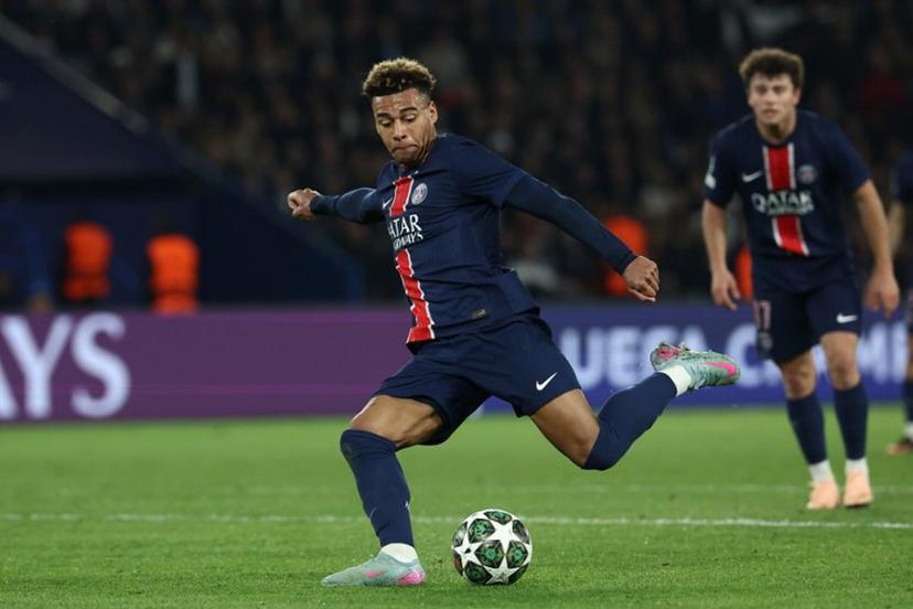 Paris Saint-Germain's French midfielder #14 Desire Doue shoots the ball during the UEFA Champions League Quarter final first leg football match between Paris Saint-Germain (FRA) and Aston Villa (ENG) at the Parc des Princes stadium in Paris on April 9, 2025.  FRANCK FIFE / AFP