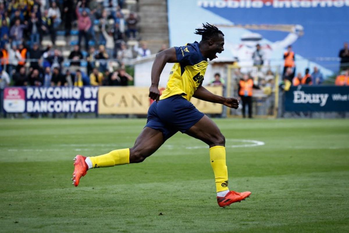 Union's Canada forward #12 Promise David celebrates after scoring a goal during the Belgian Pro League champions' play-off football match (day 10 of 10) between Royale Union Saint-Gilloise and KAA Gent, at the Joseph Marien Stadium in Brussels, on May 25, 2025.  Simon Wohlfahrt / AFP