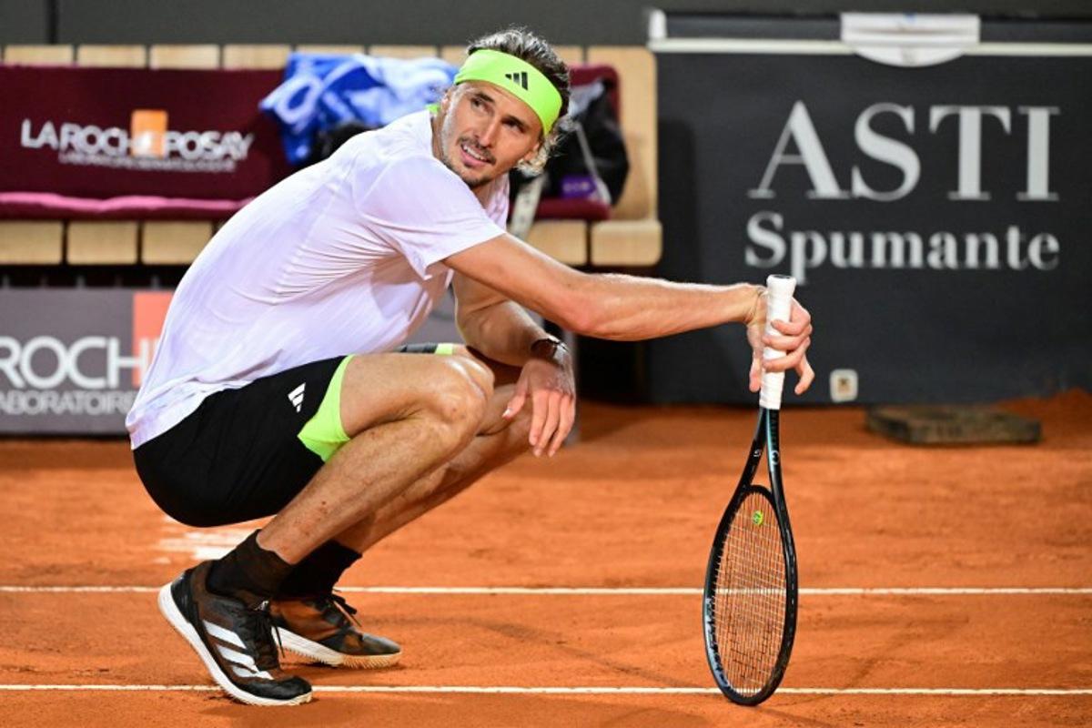 Germany's Alexander Zverev reacts during the men's singles quarter-final match against Italy's Lorenzo Musetti at the ATP Rome Open tennis tournament at Foro Italico in Rome on May 14, 2025.  PIERO CRUCIATTI / AFP