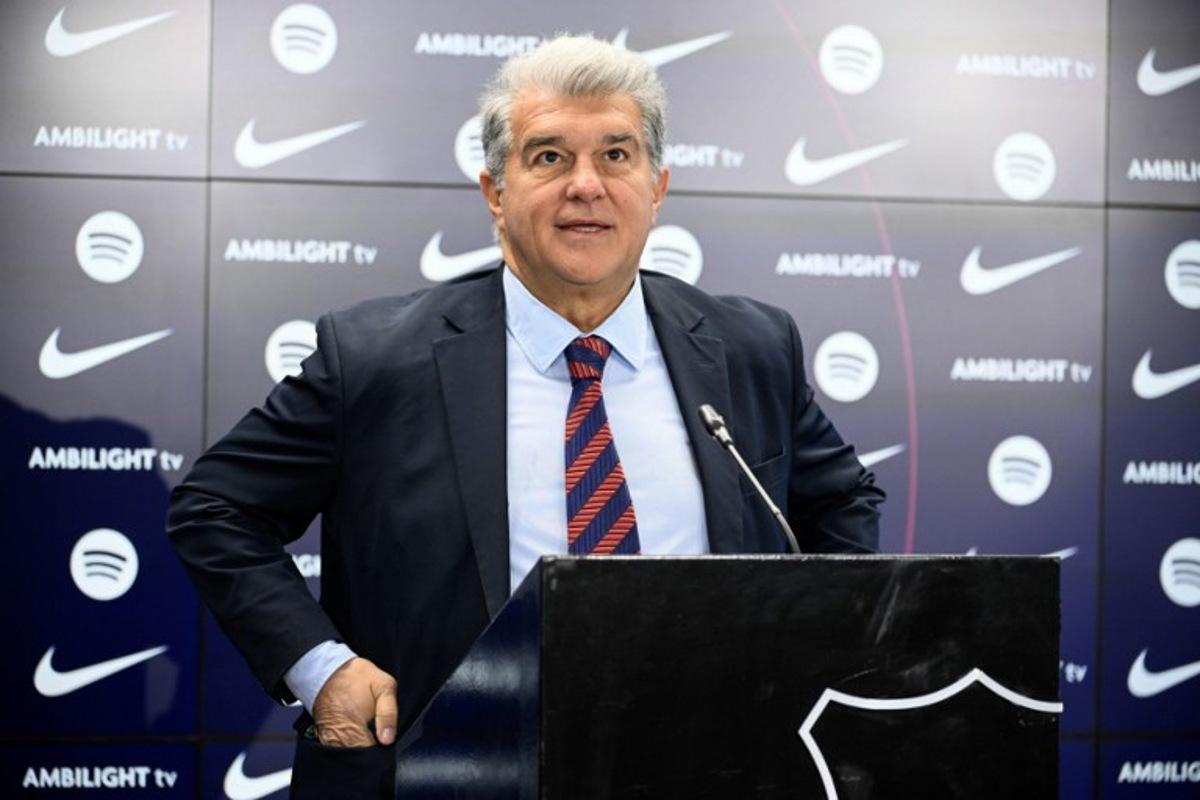 FC Barcelona's President Joan Laporta arrives for a press conference at the Ciudad Deportiva Joan Gamper in Sant Joan Despi, near Barcelona, on January 14, 2025. Dani Olmo's future at Barcelona remains in the balance as the Catalan club pursue their legal battle to get the midfielder registered to play once more. FC Barcelona's failure to meet La Liga's budgetary rules to license both Olmo and forward Pau Victor before the end of last year currently leaves them ineligible to play for the rest of the season.  Josep LAGO / AFP