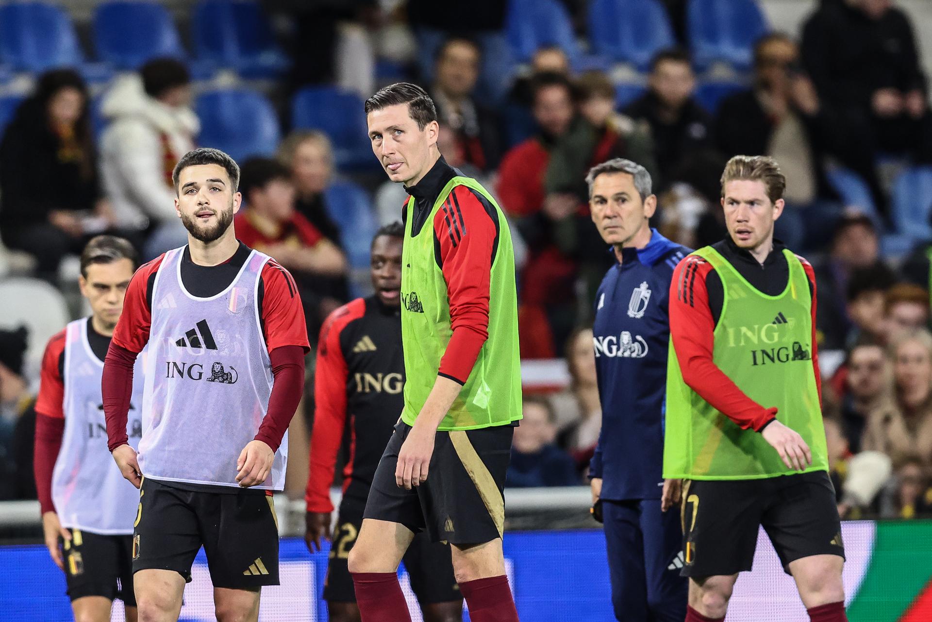 Belgium's Nicolas Raskin, Belgium's Hans Vanaken and Belgium's Kevin De Bruyne pictured in action during the warming-up for a soccer game between Belgian national team the Red Devils and Ukraine, Sunday 23 March 2025 in Genk, the return leg of the Nations League playoff. Ukraine won the first leg 3-1. BELGA PHOTO BRUNO FAHY