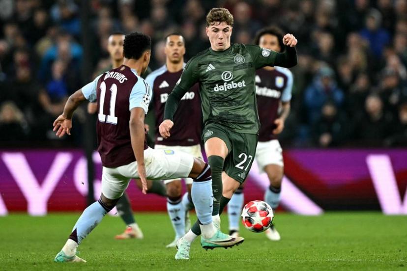 Celtic's Belgian midfielder #27 Arne Engels battles for the ball with Aston Villa's English striker #11 Ollie Watkins during the UEFA Champions League football match between Aston Villa and Celtic at Villa Park in Birmingham, central England on January 29, 2025.  JUSTIN TALLIS / AFP