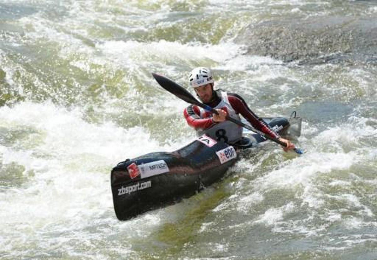 French Theo Devard competes in the Kayak K1 men race at the ICF Wildwater Canoeing Sprint World in the southern German city of  Augsburg, on June 12, 2011. AFP PHOTO/CHRISTOF STACHE
