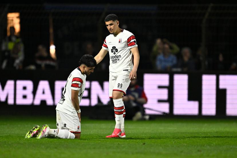 Rwdm's Mohamed El Arouch and Rwdm's Soufiane Benjdida look dejected after a soccer game between Patro Eisden Maasmechelen and RWD Molenbeek, in Maasmechelen, on day 28 of the 2024-2025 'Challenger Pro League' 1B second division of the Belgian championship, Friday 04 April 2025. BELGA PHOTO JOHAN EYCKENS