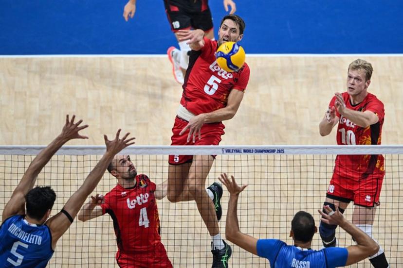 Belgium's Pieter Coolman (C) spikes the ball during the 2025 Men's Volleyball World Championship quarter-final match between Belgium and Italy at the Mall of Asia Arena in Pasay City, Metro Manila, on September 24, 2025.  Jam STA ROSA / AFP