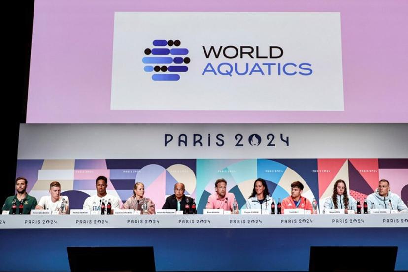 (L to R) South Africa's swimmer Chad Le Clos, Germany's swimmer Florian Wellbrock, France's water polo player Thomas Vernoux, Canada's swimmer Jacqueline Simoneau, World Aquatics President Husain al-Musallam and Executive Director Brent Novicki, US' water polo player Maggie Steffens, Britain's Diver Tom Daley, and US' swimmers Regan Smith and Caeleb Dressel attend the World Aquatics Olympic press conference ahead of the Paris 2024 Olympic Games in Paris, on July 25, 2024.  STEPHANE DE SAKUTIN / AFP