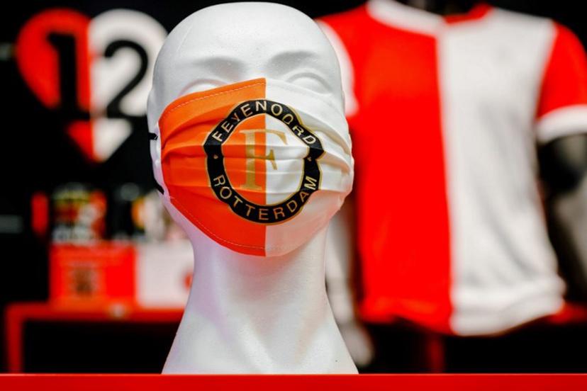 A picture taken on June 6, 2020 shows a mannequin's head with a protective face mask with the Feyenoord logo at the fanshop of the Dutch football club in Rotterdam, The Netherlands.  Marco DE SWART / ANP / AFP