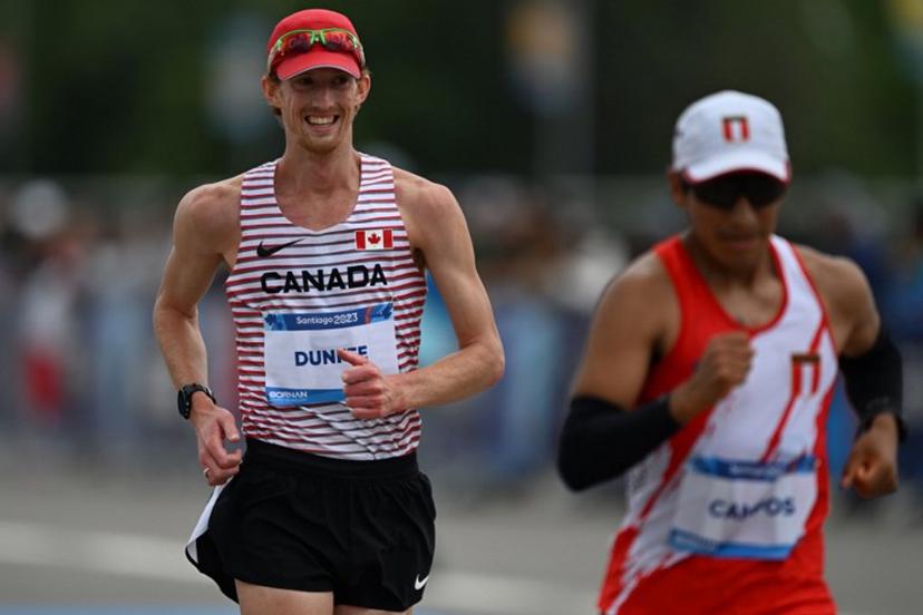 Canada's Evan Dunfee competes in the athletics men's 20km walk race during the Pan American Games Santiago 2023 in Santiago, on October 29, 2023.  MAURO PIMENTEL / AFP