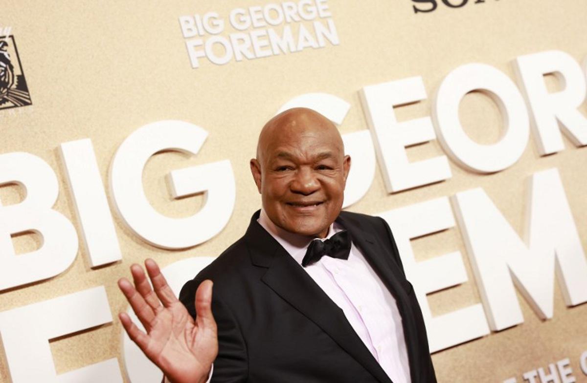 (FILES) Retired pro-boxer George Foreman arrives for the world premiere of "Big George Foreman: The Miraculous Story of the Once and Future Heavyweight Champion of the World," at Regal LA Live in Los Angeles, California, on April 26, 2023.  Former heavyweight boxing champion George Foreman, who fought an iconic battle with Muhammad Ali before later reclaiming the title two decades later, died March 21 aged 76, his family announced in a statement. "With profound sorrow, we announce the passing of our beloved George Edward Foreman Sr, who peacefully departed on March 21, 2025, surrounded by loved ones," the statement said.  Michael Tran / AFP