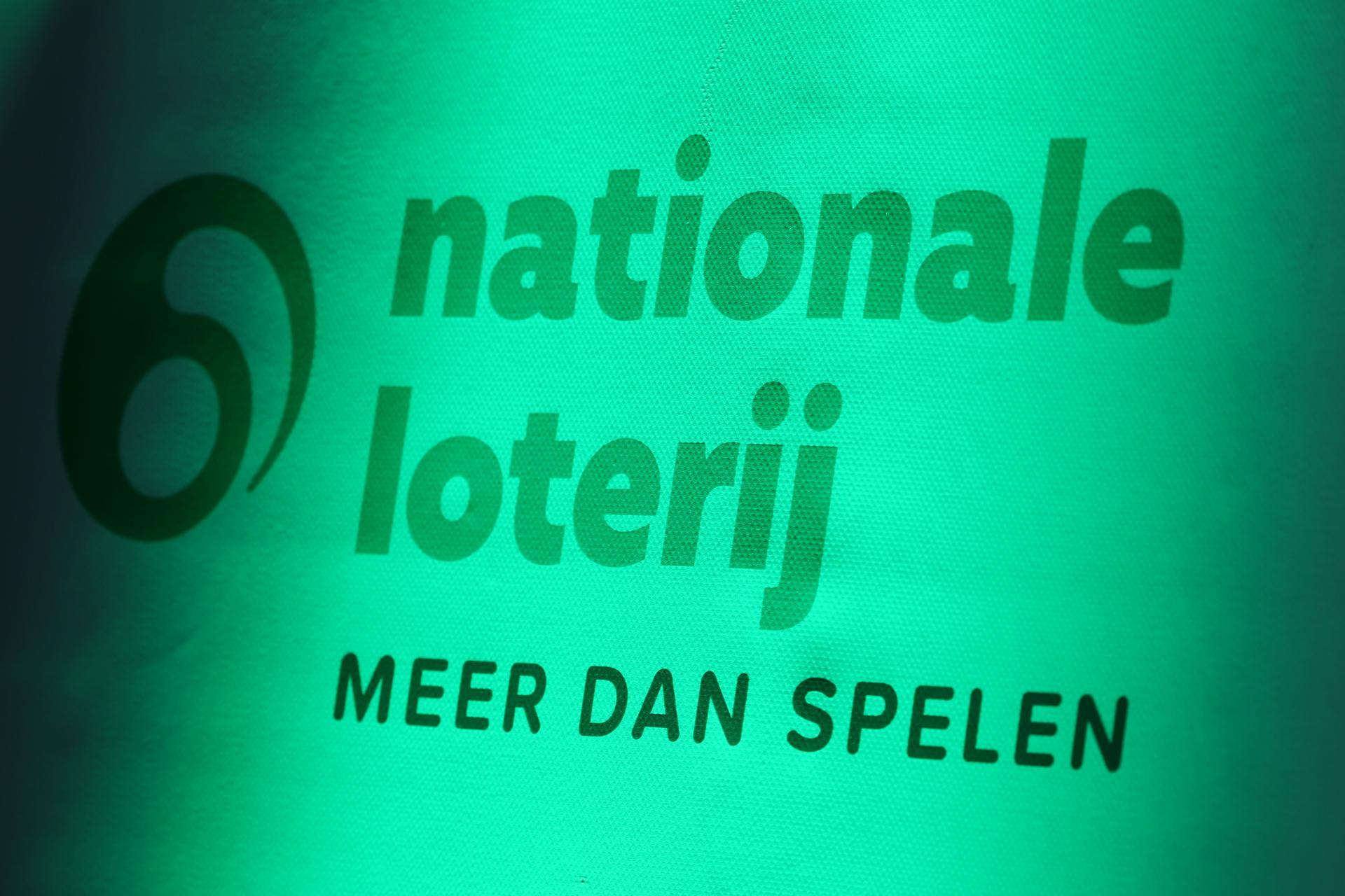 The Nationale Loterij logo pictured on a screen during the presentation of the 2024 figures for the National Lottery players, winners, profits and sales, organised at Cirque Royal/Koninklijk Circus, in Brussels, Thursday 23 January 2025. BELGA PHOTO BENOIT DOPPAGNE