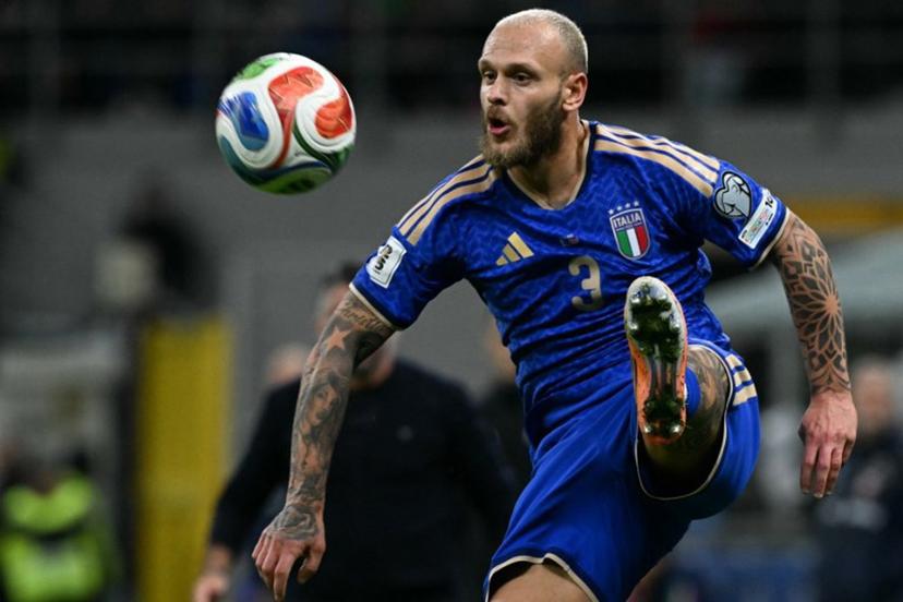 Italy's defender #03 Federico Dimarco controls the ball during the FIFA World Cup 2026 European qualification football match between Italy and Norway, at the San Siro Stadium, in Milan, on November 16, 2025.     Stefano RELLANDINI / AFP