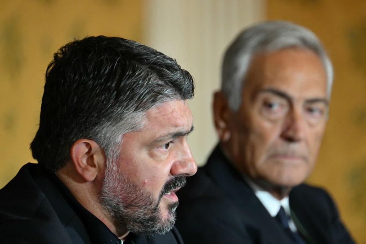 Italy's national football team headcoach Gennaro Gattuso (L), speaks next to the president of the Italian Football Federation (Figc) Gabriele Gravina during a press conference in Rome on June 19, 2025. Gennaro Gattuso was named Italy's new coach and will be tasked with helping the Azzurri qualify for the 2026 World Cup after replacing Luciano Spalletti. Alberto PIZZOLI / AFP