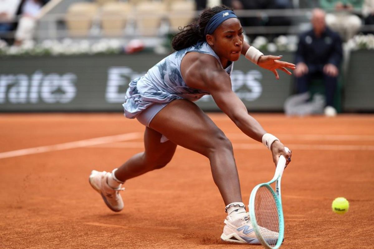 US Coco Gauff plays a forehand return to Australia's Olivia Gadecki during their women's singles match on day 3 of the French Open tennis tournament on Court Philippe-Chatrier at the Roland-Garros Complex in Paris on May 27, 2025.  FRANCK FIFE / AFP